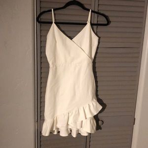 A white mini dress perfect for any occasion!